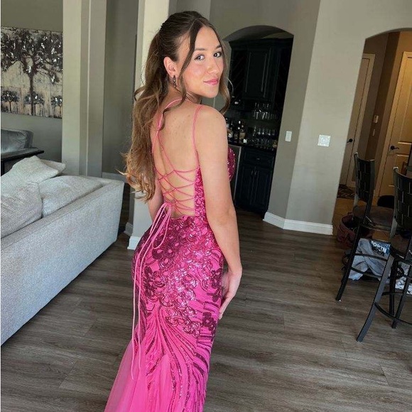 A prom dress in a size 4 with slight alterations. - Picture 2 of 2